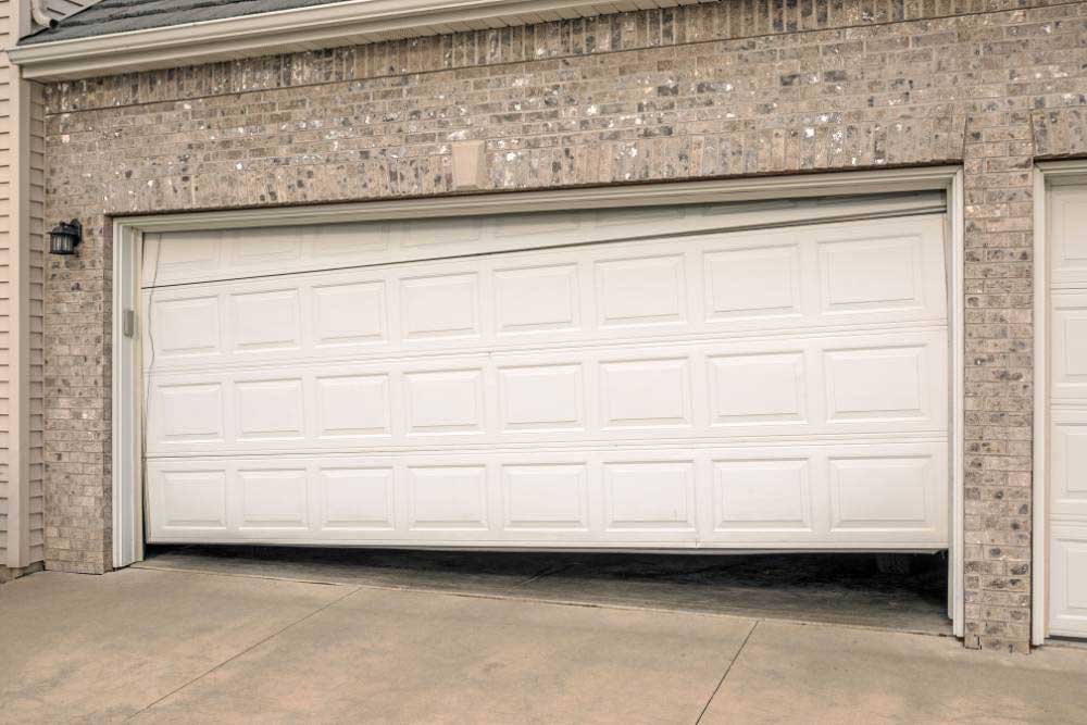 off-track-door-1 Off Track Garage Door Repair in Green Bay & Appleton